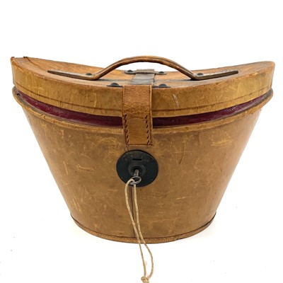 Lot 113 - A Victorian silk top hat and leather case.