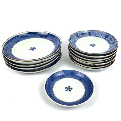 Lot 351 - Thirteen Japanese Nabeshima blue and white porcelain plates, 19th century.