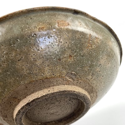 Lot 462 - A Japanese pottery glazed dish, 18th/19th century.