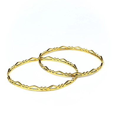 Lot 1 - An Indian 22ct gold pair of bangles.