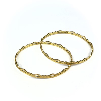 Lot 1 - An Indian 22ct gold pair of bangles.