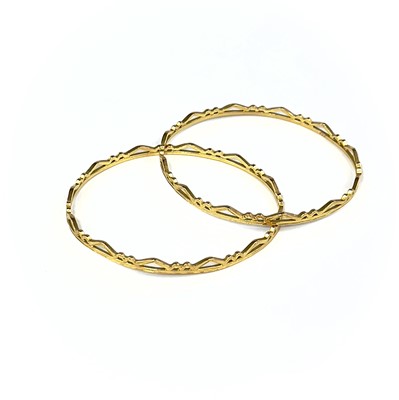 Lot 1 - An Indian 22ct gold pair of bangles.