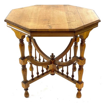 Lot 1930 - An Arts and Crafts walnut octagonal occasional table.