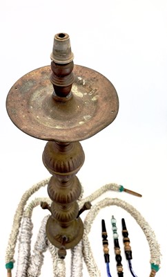 Lot 56 - A tall pierced Indian brass hookah.