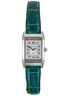 Lot 498 - A Jaeger LeCoultre Reverso Duetto diamond set stainless steel manual wind ladies wristwatch.