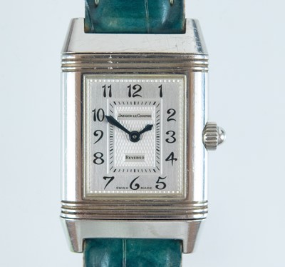 Lot 498 - A Jaeger LeCoultre Reverso Duetto diamond set stainless steel manual wind ladies wristwatch.