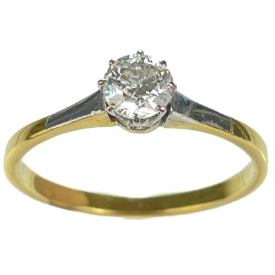 Lot 152 - An 18ct (tested) gold and platinum 0.50ct diamond solitaire ring.