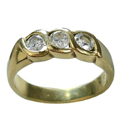 Lot 316 - An 18ct diamond three stone ring.