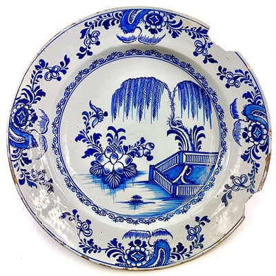 Lot 163 - A Dutch Delft blue and white charger.