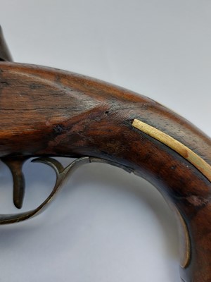 Lot 31 - A  brass mounted flintlock pistol.