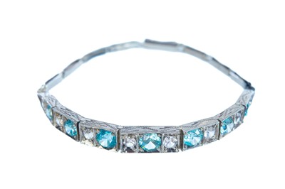 Lot 368 - An attractive 1920's Art Deco platinum blue zircon and silica glass set bracelet.