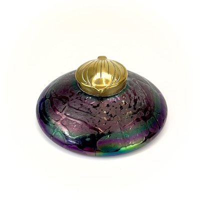 Lot 413 - An Art Nouveau Loetz type iridescent circular glass inkwell.