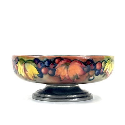 Lot 405 - A Liberty & Co Tudric pewter mounted Moorcroft pottery footed bowl.