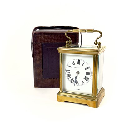 Lot 1711 - A French brass cased carriage timepiece, retailed by Mappin & Webb, London.