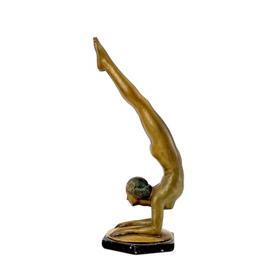 Lot 453 - An Art Deco bronze painted plaster figure of a female acrobat.