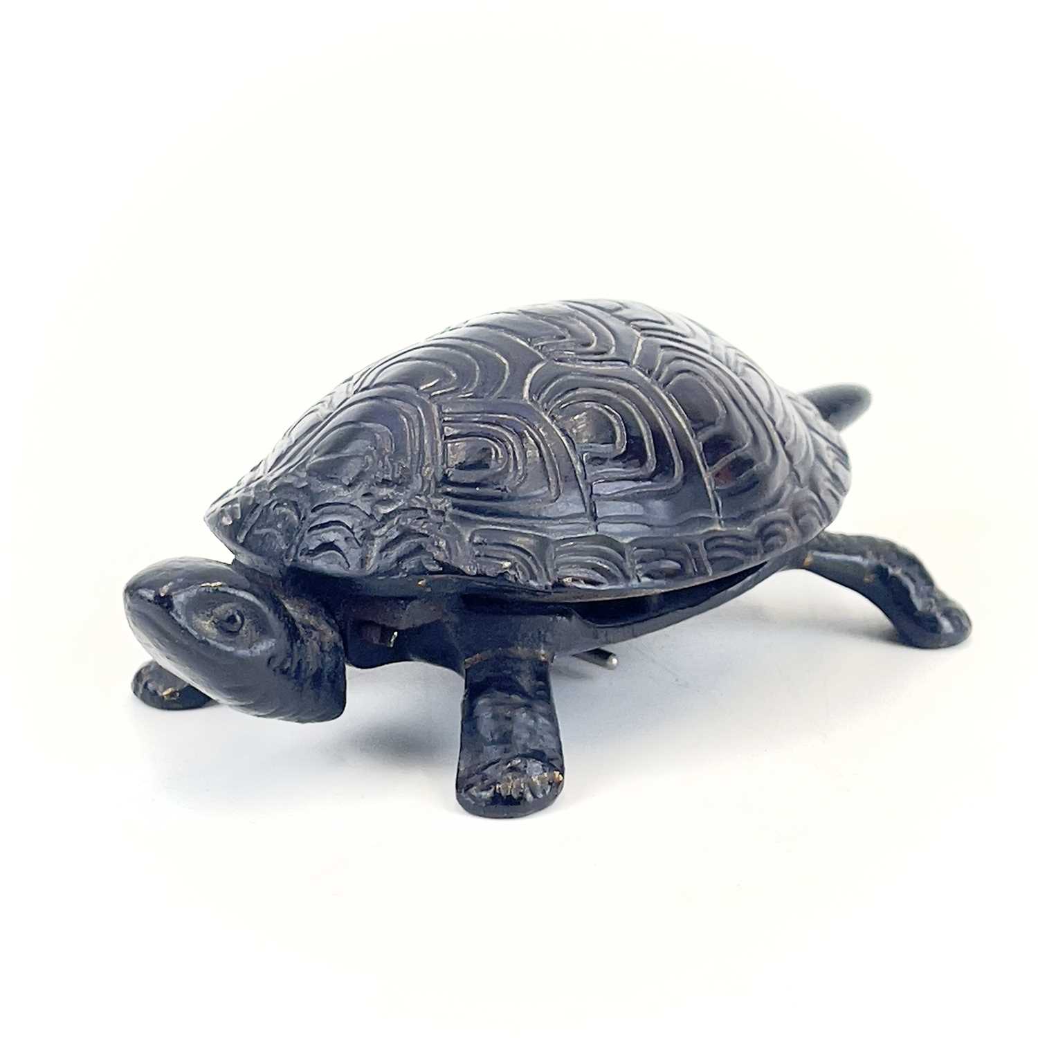 Lot 116 - A 20th century German made cast iron counter bell in the form of a tortoise.