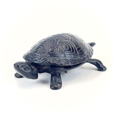 Lot 116 - A 20th century German made cast iron counter bell in the form of a tortoise.