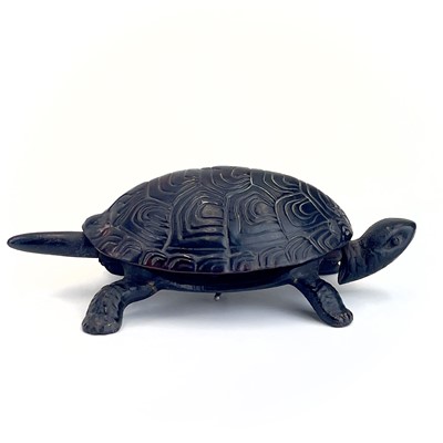 Lot 116 - A 20th century German made cast iron counter bell in the form of a tortoise.