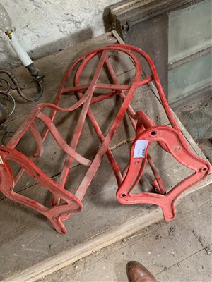 Lot 82 - Two wrought and cast iron saddle rests.