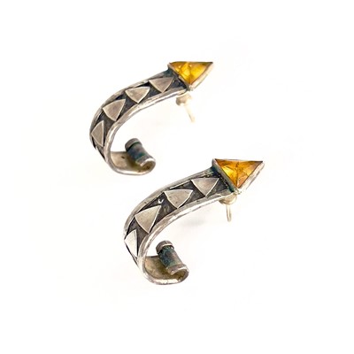 Lot 452 - A pair of contemporary silver and citrine set earrings by Charmian Harris.