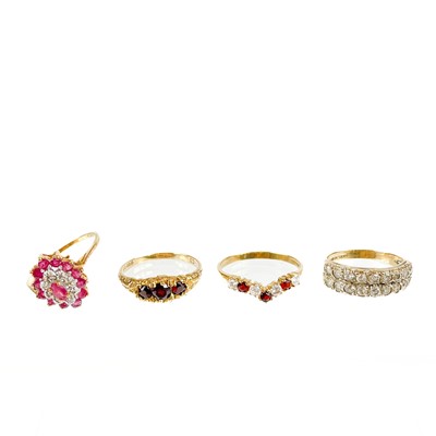 Lot 60 - Four 9ct gold stone set rings.