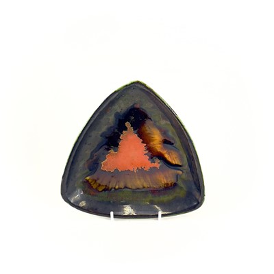 Lot 857 - An Eric Leaper pottery triangular dish.