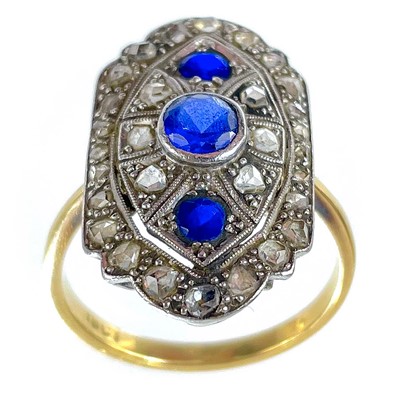 Lot 158 - An Art Deco period 18ct yellow and white gold diamond and sapphire panel ring.