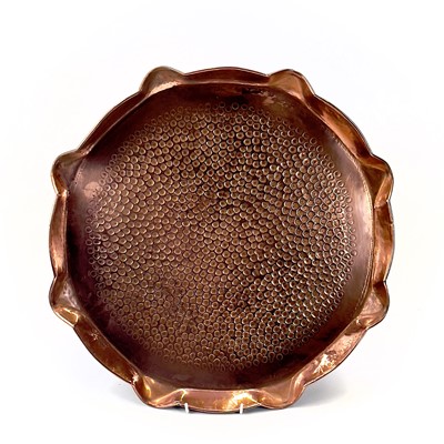 Lot 136 - An Arts and Crafts Hayle copper tray of circular form