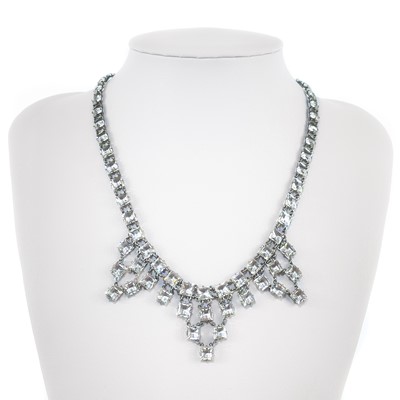 Lot 428 - A stylish white metal and white crystal glass set fringe necklace.