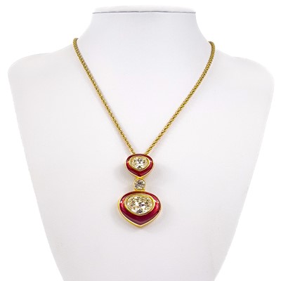 Lot 541 - A stylish Christian Dior gilt metal and guilloche enamel pendant necklace.