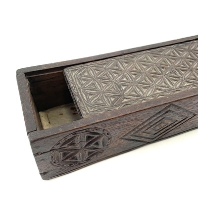 Lot 8 - An oak chip carved pencil box.