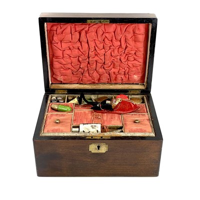 Lot 75 - A Victorian mahogany workbox, with contents.