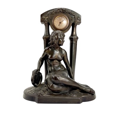 Lot 1714 - A French Art Deco spelter mantel timepiece.