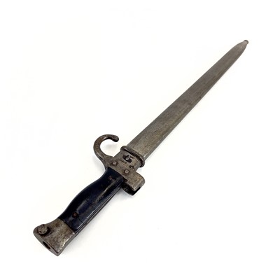 Lot 115 - A WWI bayonet and scabbard.