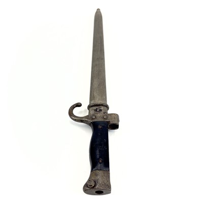 Lot 115 - A WWI bayonet and scabbard.