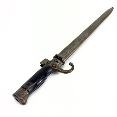 Lot 115 - A WWI bayonet and scabbard.