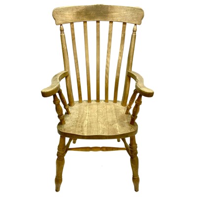 Lot 133 - A beech kitchen Windsor armchair.