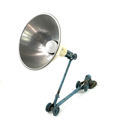 Lot 531 - A Dugdills industrial machinist wall mounted lamp with later enamel shade.