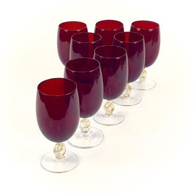 Lot 844 - A set of eight Venetian glass wine glasses.