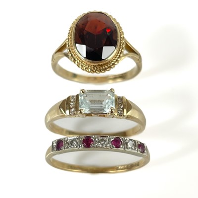 Lot 125 - Three 9ct gold stone set rings.