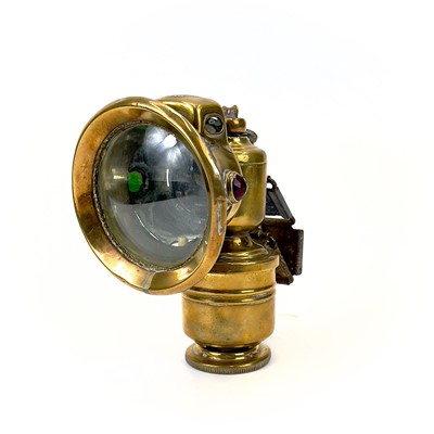 Lot 287 - An early 20th century brass bicycle lantern by Panther P&H Birmingham.