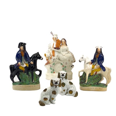 Lot 838 - A pair of Staffordshire figures of Dick Turpin and Tom King.