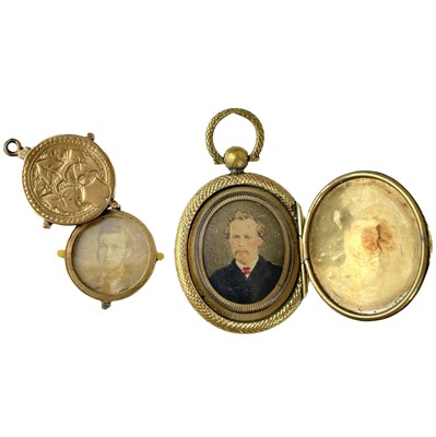 Lot 170 - A Victorian gold front and back locket pendant and a gold locket fob.