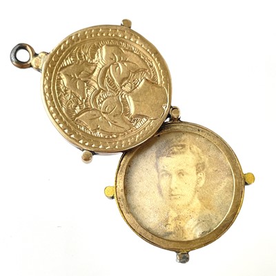 Lot 170 - A Victorian gold front and back locket pendant and a gold locket fob.