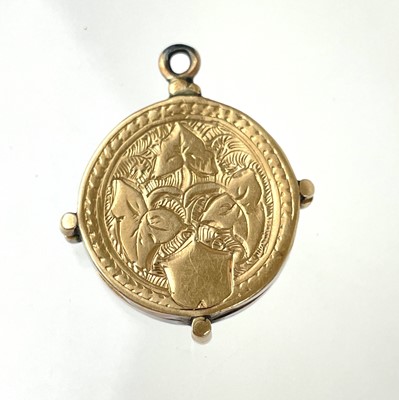 Lot 170 - A Victorian gold front and back locket pendant and a gold locket fob.