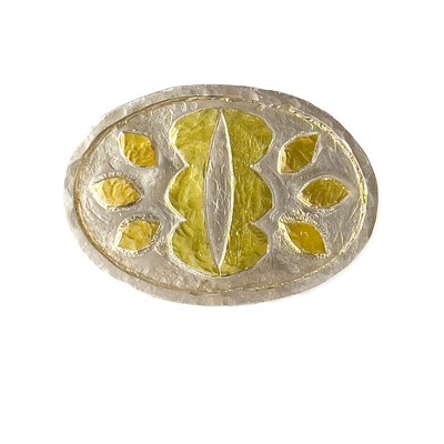 Lot 6 - A contemporary silver and gold applied oval brooch by Guy Royle.