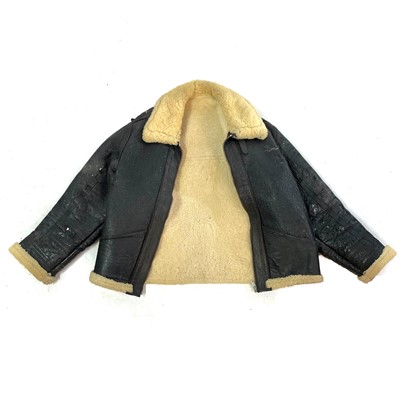 Lot 93 - A Second World War RAF black leather and sheepskin flying jacket.