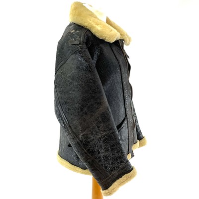 Lot 93 - A Second World War RAF black leather and sheepskin flying jacket.