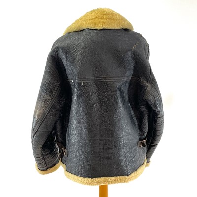 Lot 93 - A Second World War RAF black leather and sheepskin flying jacket.