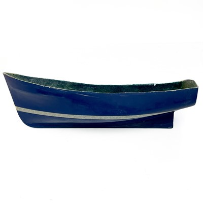 Lot 506 - Three painted fibreglass model boat hulls.